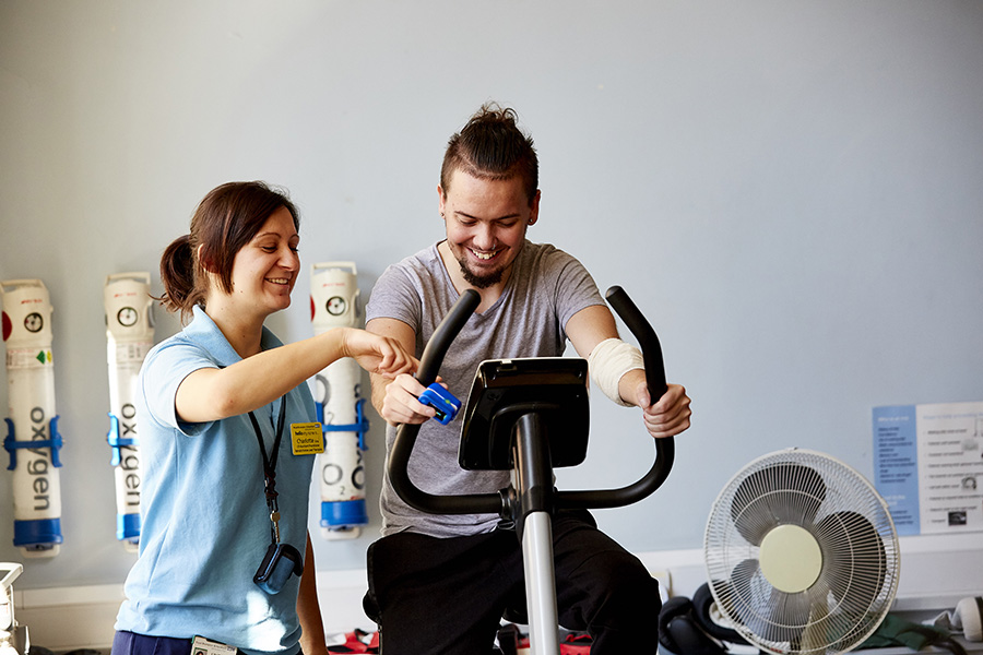 A cystic fibrosis patient on an exercise bike