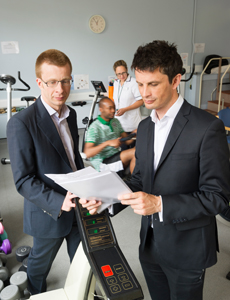 Dr James Hull (right) with colleagues in the exercise lab