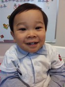 Samuel as a toddler, smiling