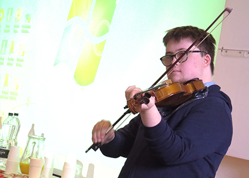 Transition patient playing the violin