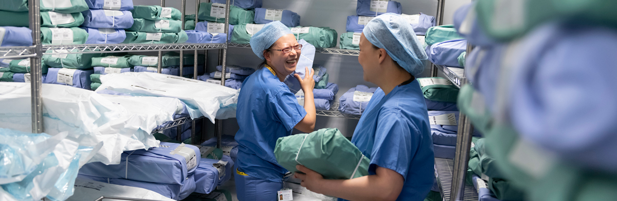 Theatre nurses collecting supplies from storage