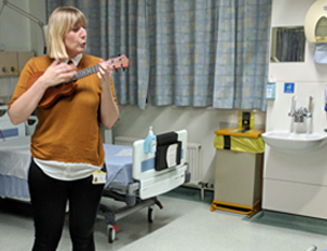 Stac Dowdeswell singing on a ward