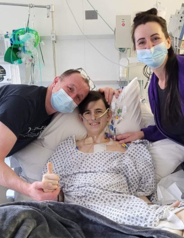 Jack with his parents after surgery