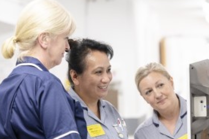 Nurses looking at computer 